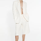 Bermuda larga pliegues