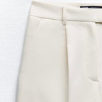 Bermuda larga pliegues