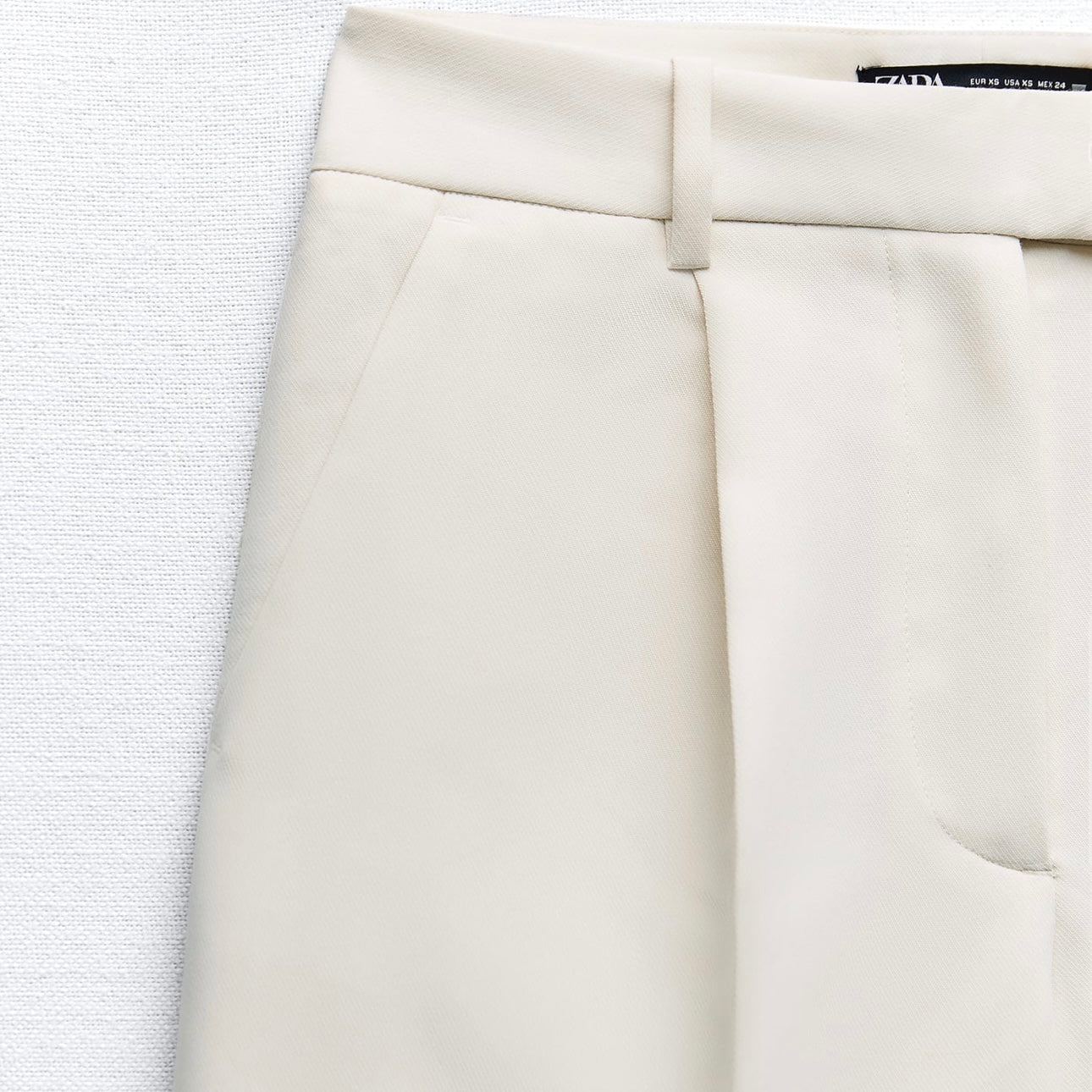 Bermuda larga pliegues