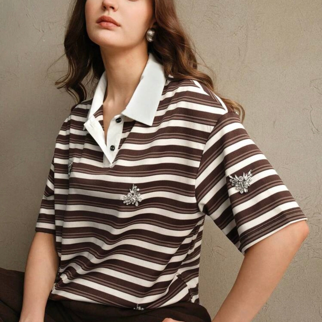 Polo de rayas con detalles