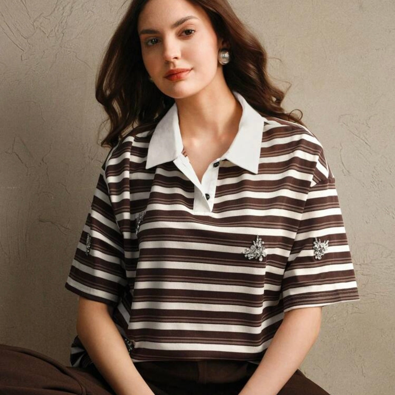 Polo de rayas con detalles