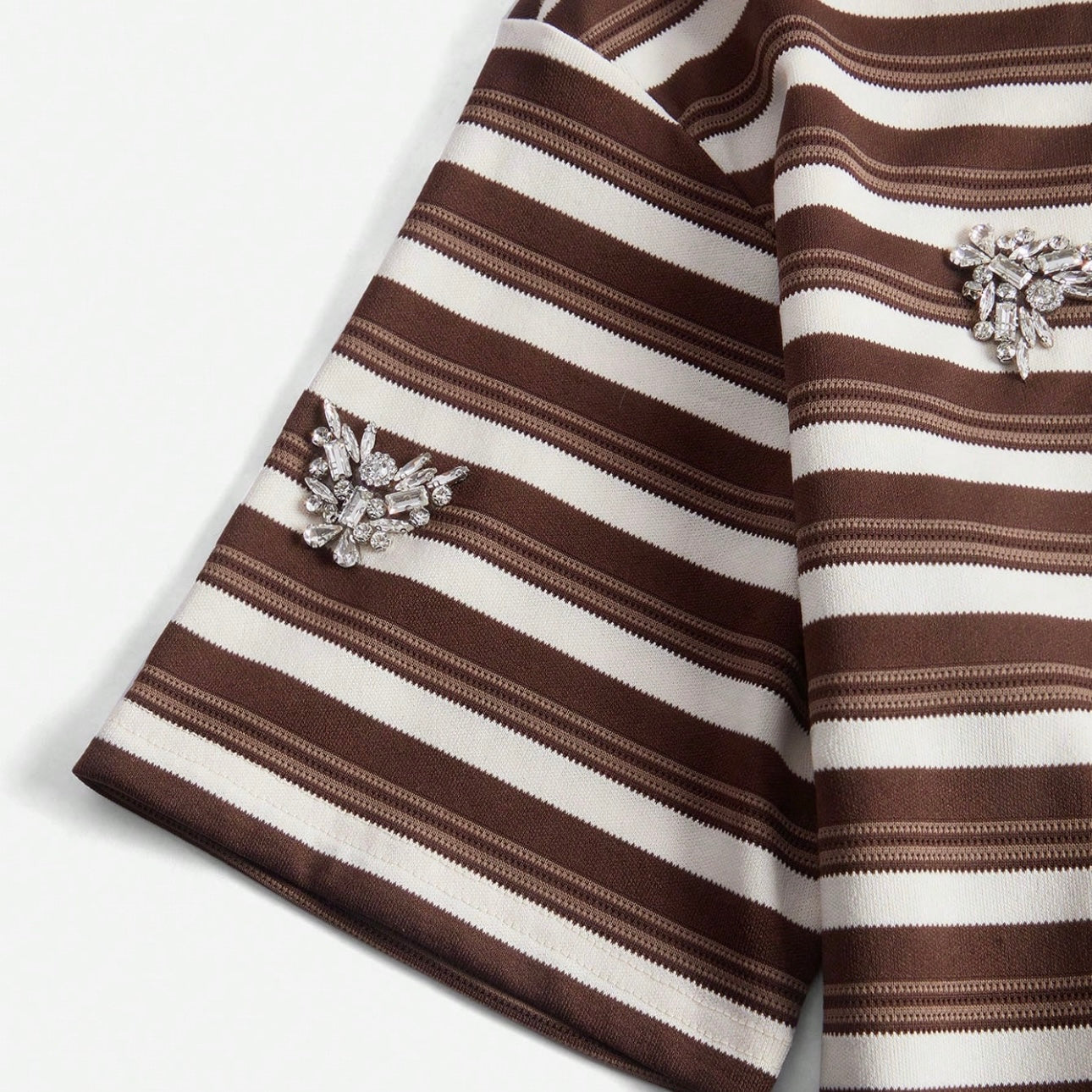 Polo de rayas con detalles