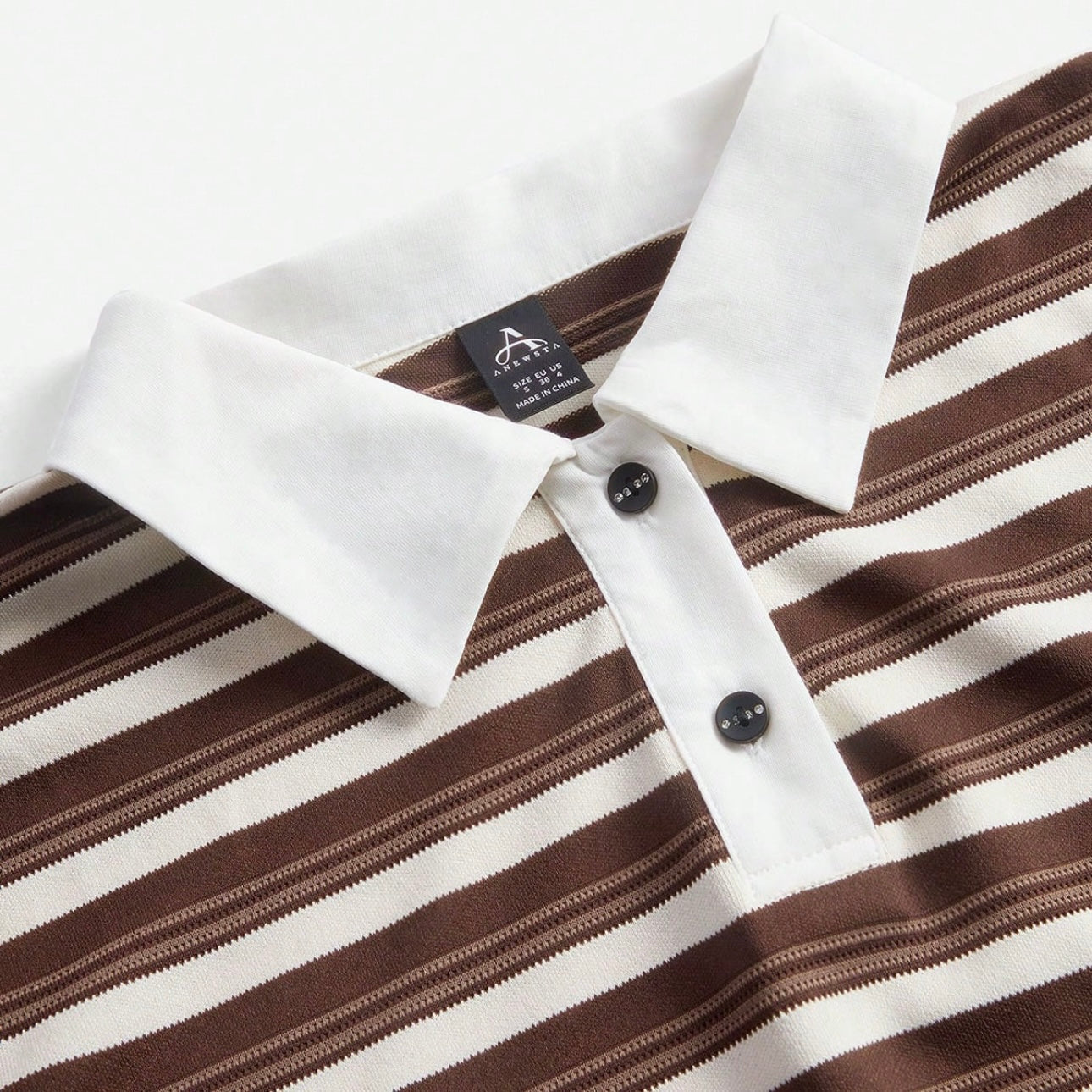 Polo de rayas con detalles