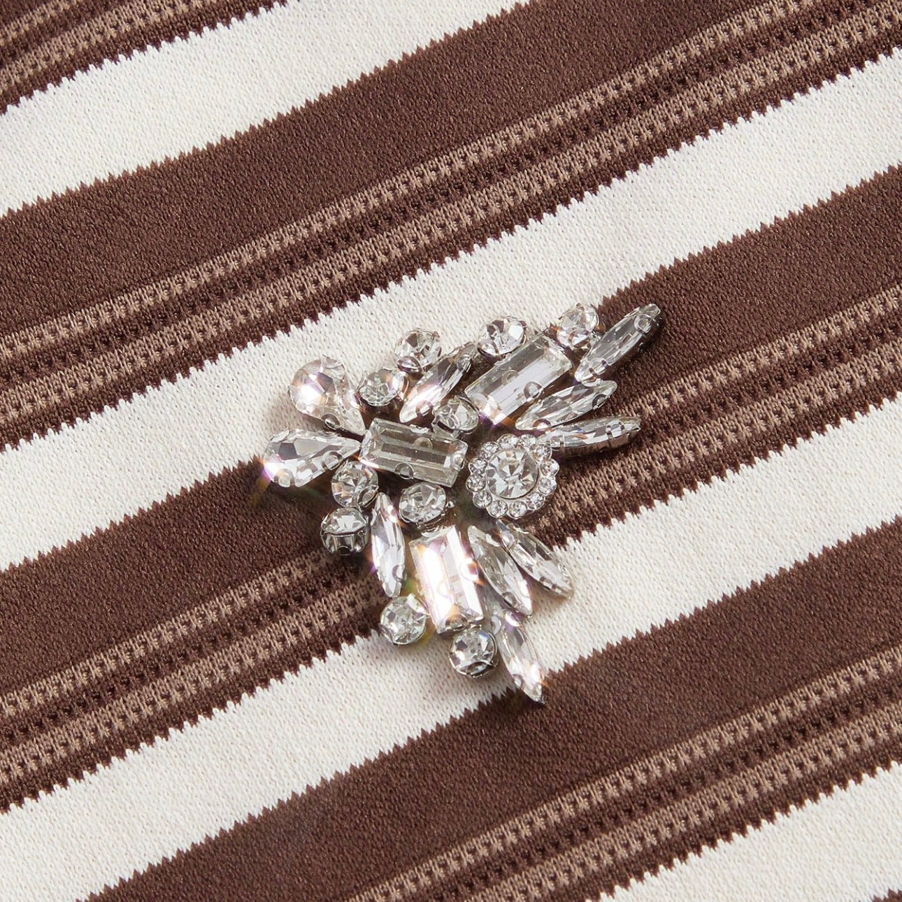 Polo de rayas con detalles